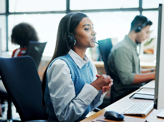 Customer service representative wearing a headset